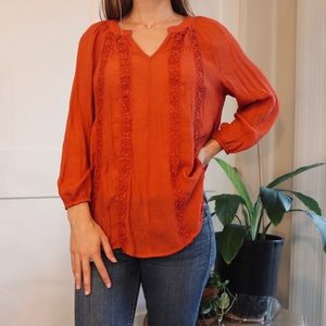 Burnt orange blouse!